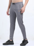 Side profile of IBX men’s track pants highlighting breathable fabric and streamlined design - Gray